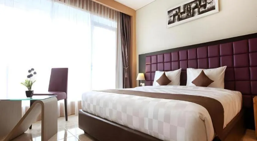 Bed in Asoka Luxury Hotel