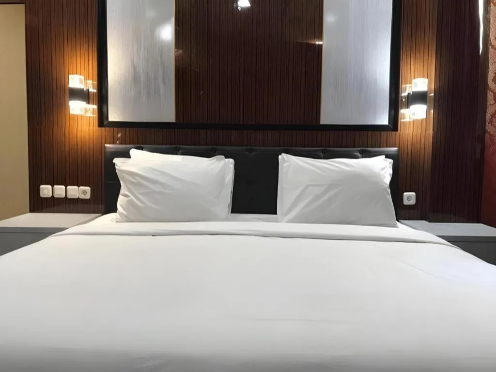 Bed in Asoka Luxury Hotel