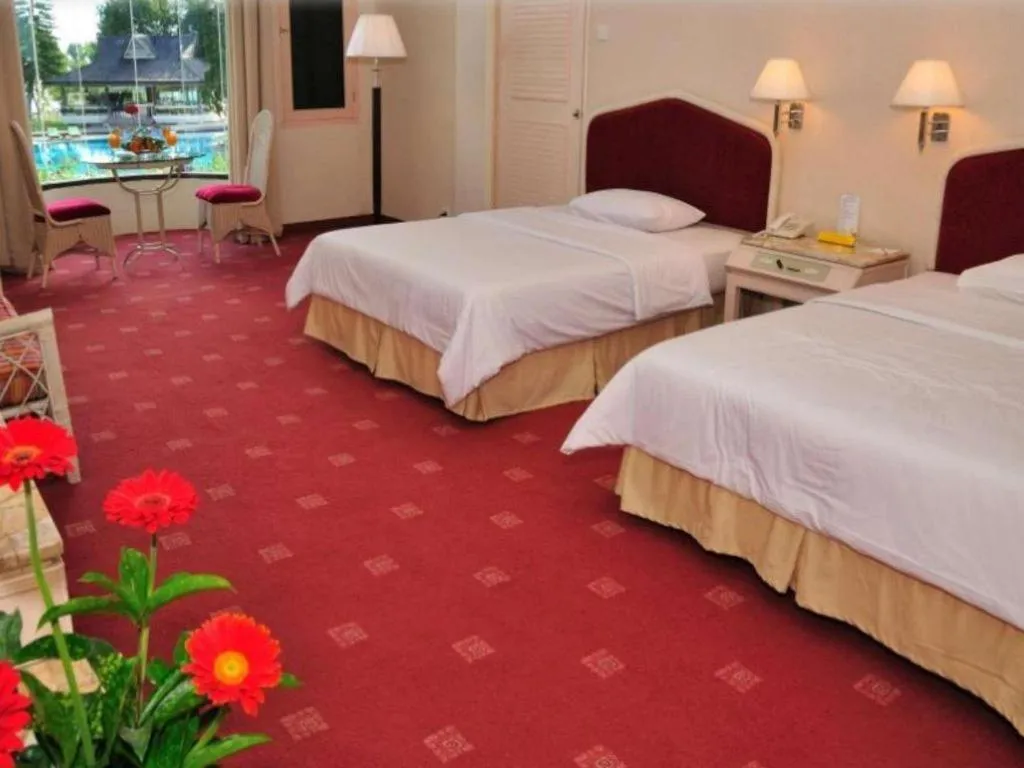 Bed in Grand Mutiara Hotel