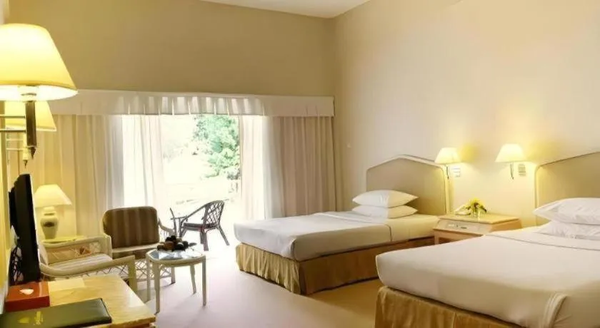 Bed in Grand Mutiara Hotel