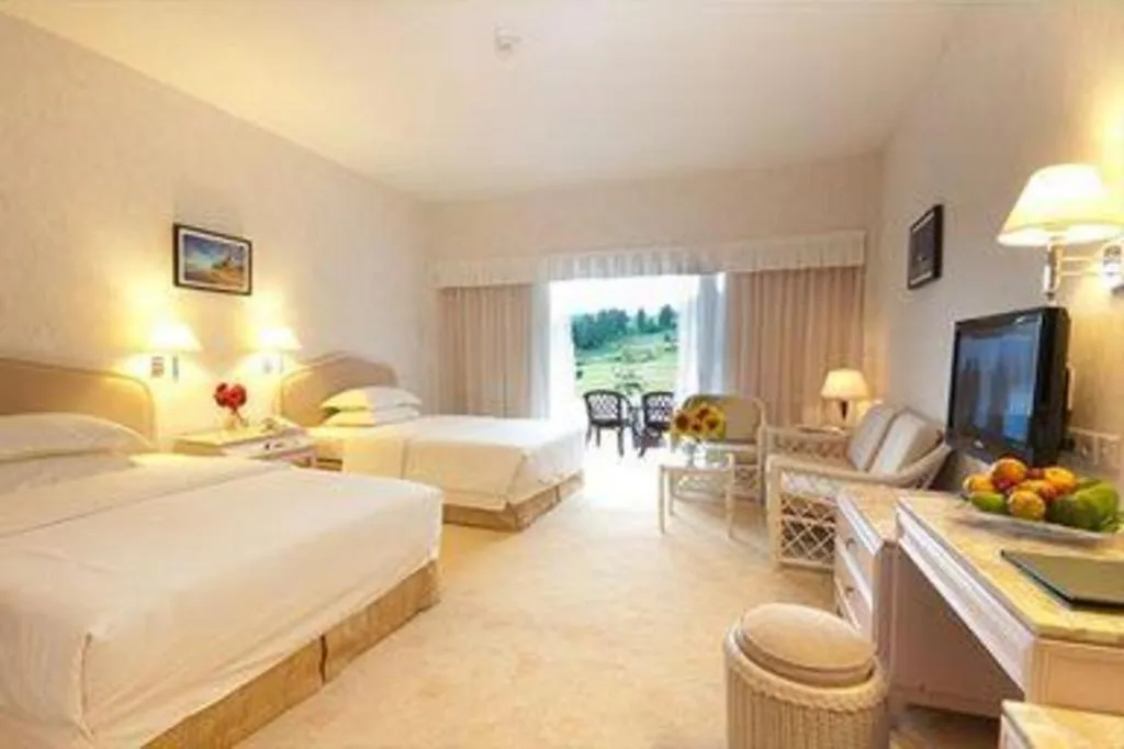 Bed in Grand Mutiara Hotel