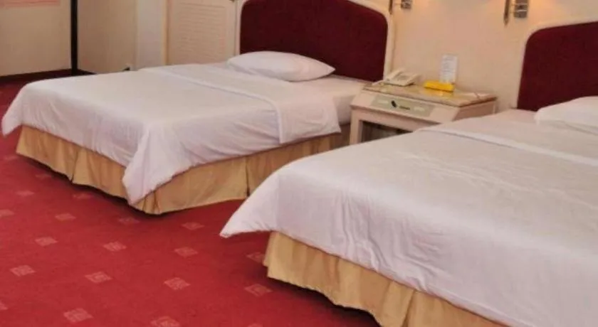 Bed in Grand Mutiara Hotel