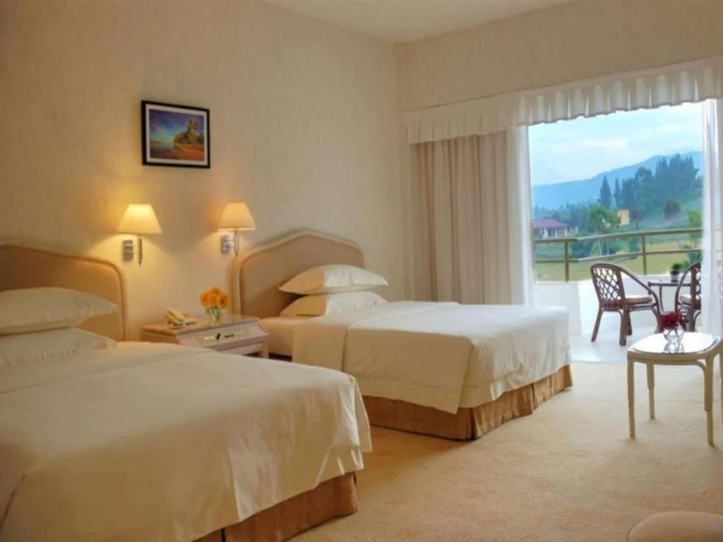 Bed in Grand Mutiara Hotel