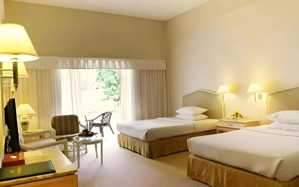 Bed in Grand Mutiara Hotel