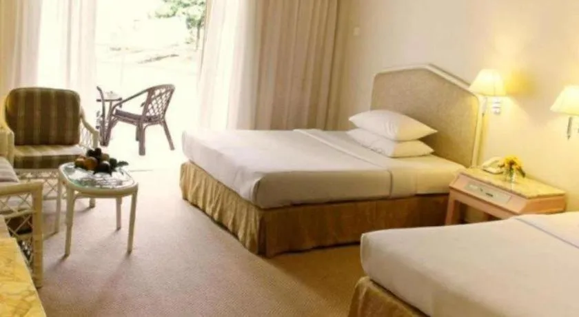 Bed in Grand Mutiara Hotel