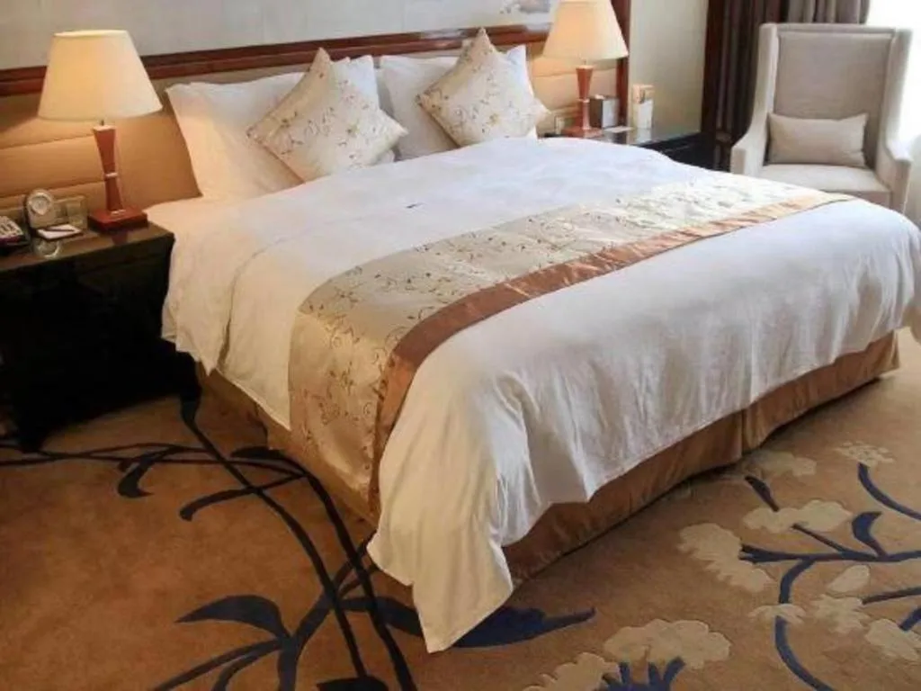 Bed in Yang Peng Jin Jiang Hotel