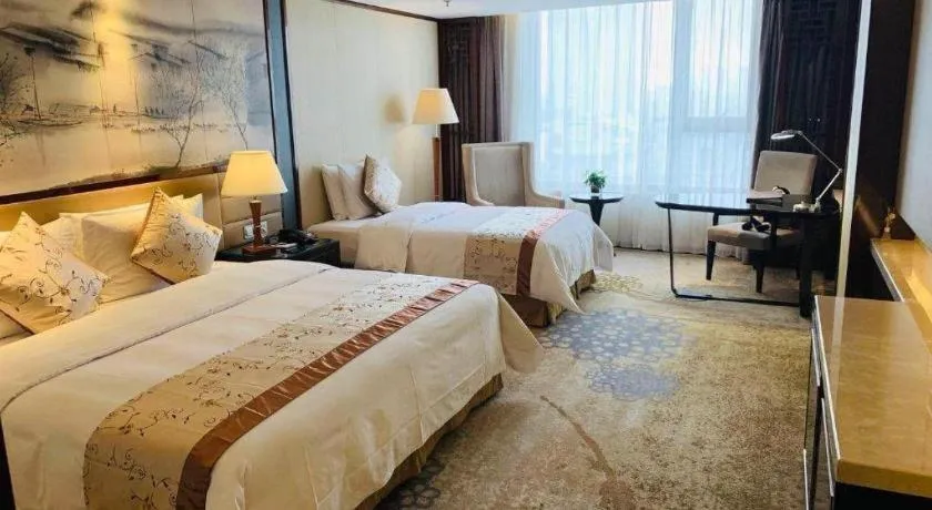 Bed in Yang Peng Jin Jiang Hotel