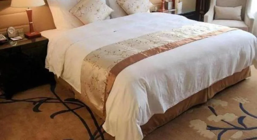 Bed in Yang Peng Jin Jiang Hotel