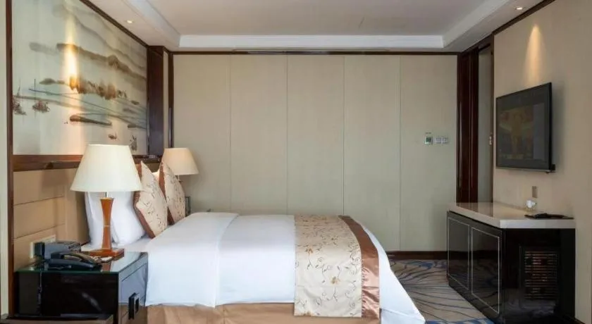 Bed in Yang Peng Jin Jiang Hotel