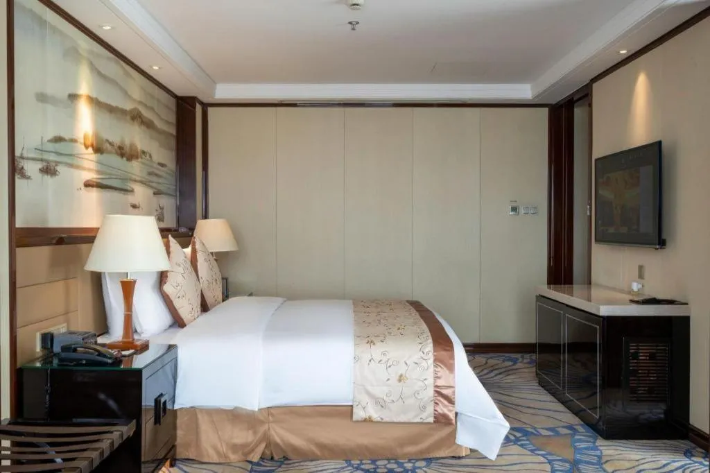 Bed in Yang Peng Jin Jiang Hotel