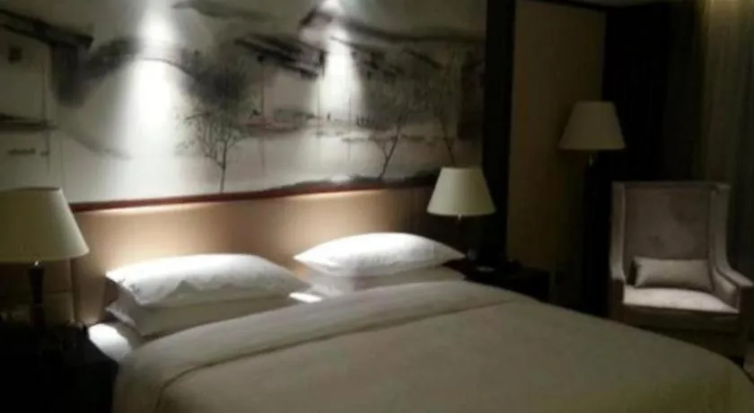 Bed in Yang Peng Jin Jiang Hotel