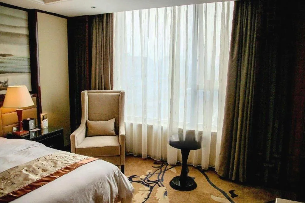 Bed in Yang Peng Jin Jiang Hotel