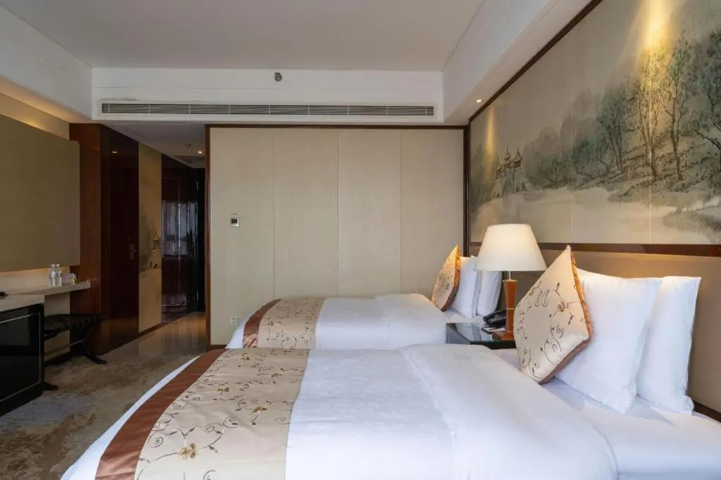 Bed in Yang Peng Jin Jiang Hotel