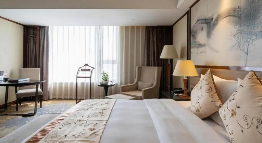 Bed in Yang Peng Jin Jiang Hotel