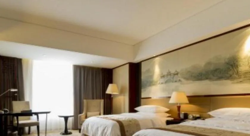 Bed in Yang Peng Jin Jiang Hotel