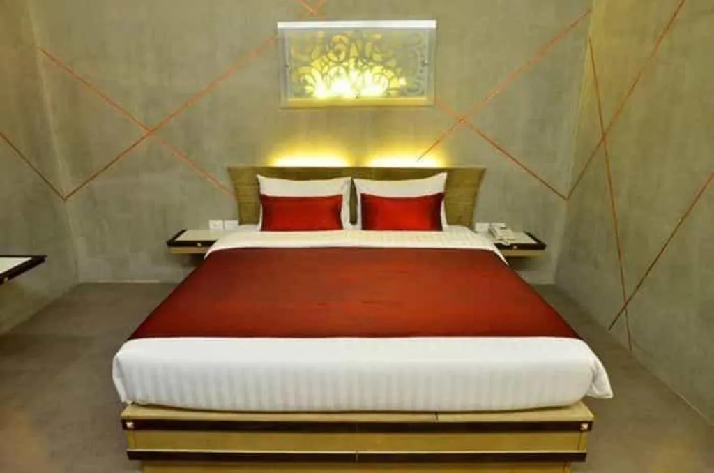 Bed in Loft Living Hotel Khonkaen