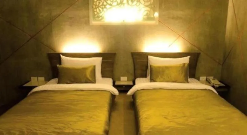 Bed in Loft Living Hotel Khonkaen