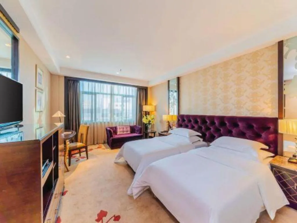 Bed in Dongguan Silver World Garden Hotel