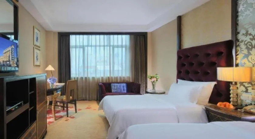 Bed in Dongguan Silver World Garden Hotel