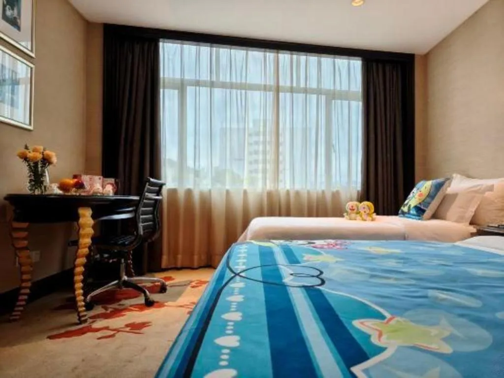 Bed in Dongguan Silver World Garden Hotel