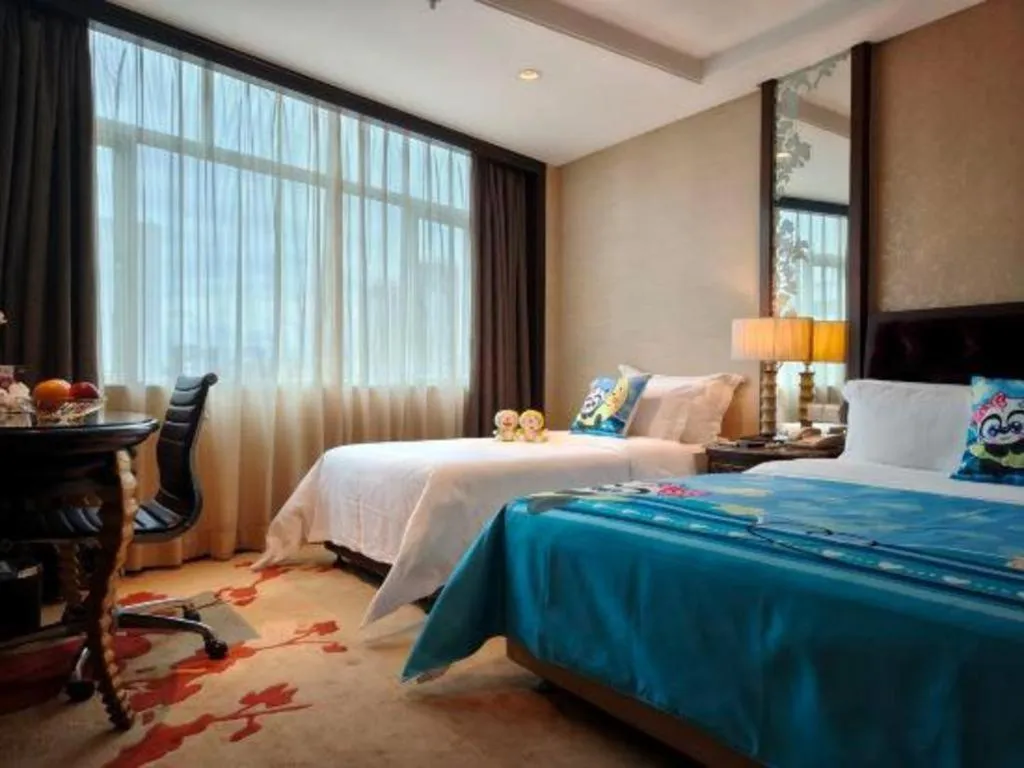 Bed in Dongguan Silver World Garden Hotel