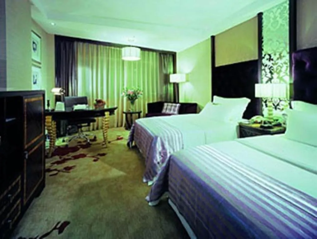 Bed in Dongguan Silver World Garden Hotel