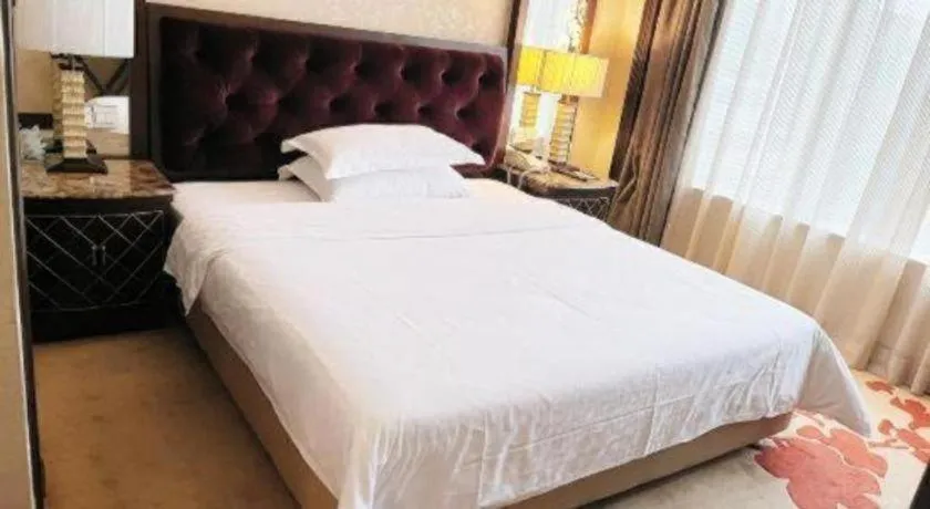 Bed in Dongguan Silver World Garden Hotel