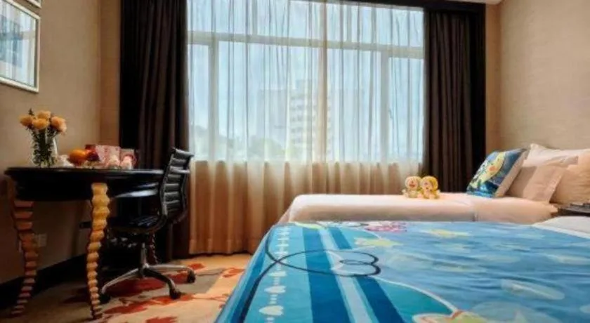 Bed in Dongguan Silver World Garden Hotel