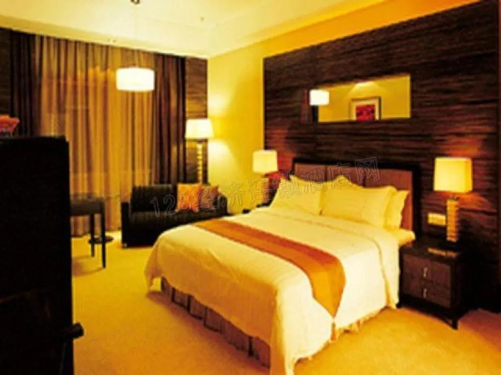 Bed in Dongguan Silver World Garden Hotel