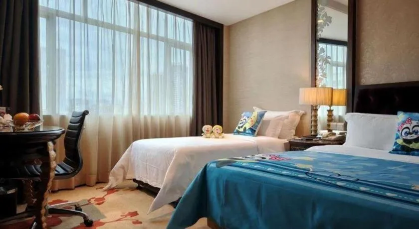 Bed in Dongguan Silver World Garden Hotel