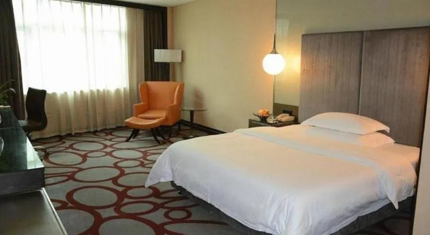 Bed in Dongguan Silver World Garden Hotel