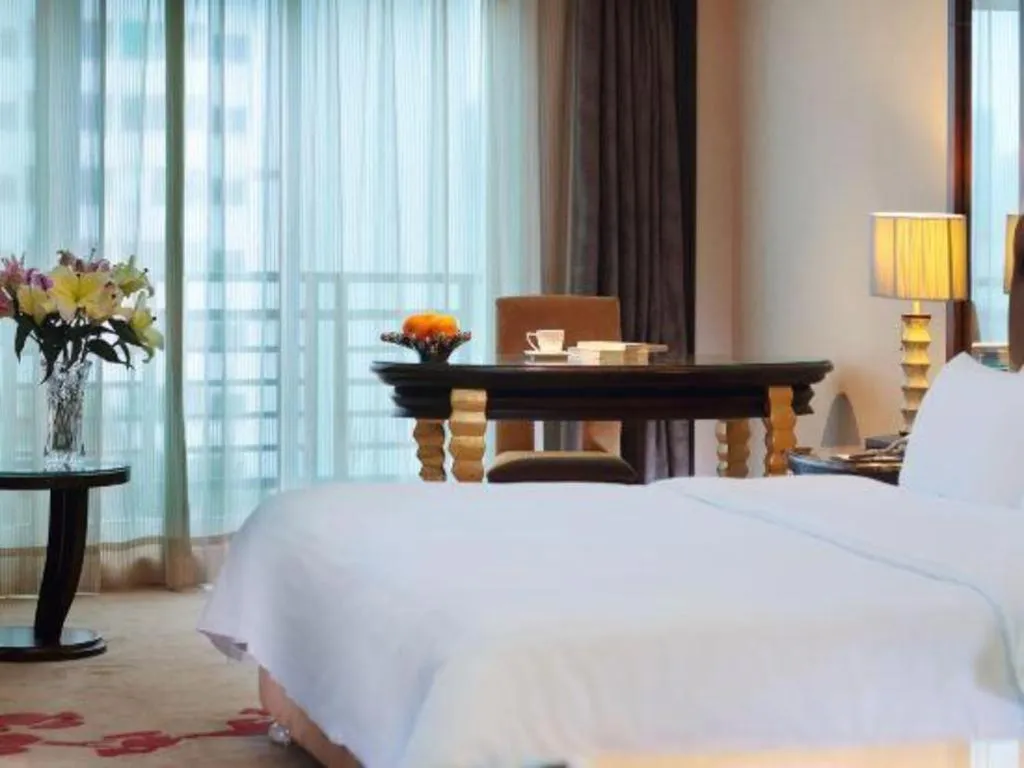 Bed in Dongguan Silver World Garden Hotel