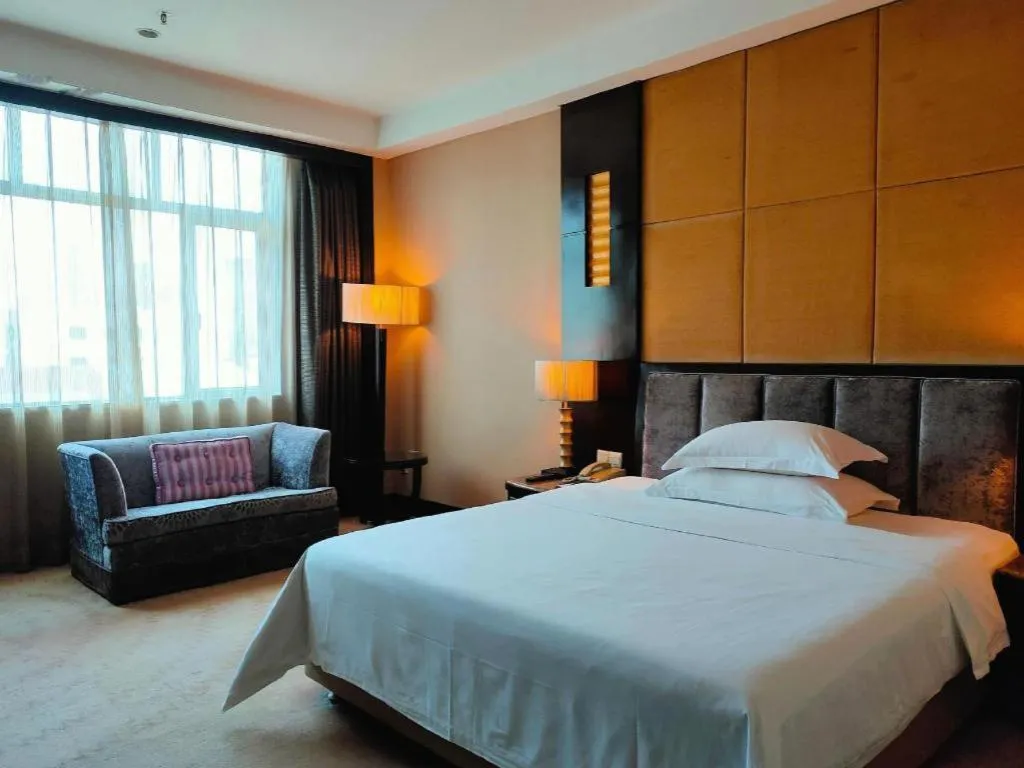 Bed in Dongguan Silver World Garden Hotel