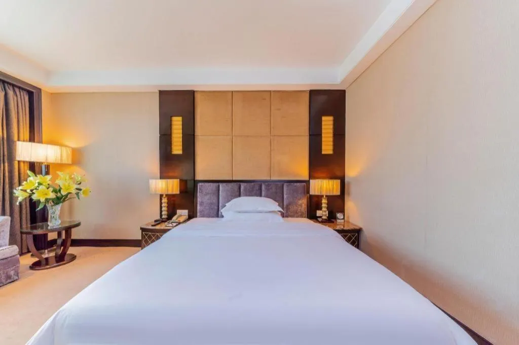 Bed in Dongguan Silver World Garden Hotel