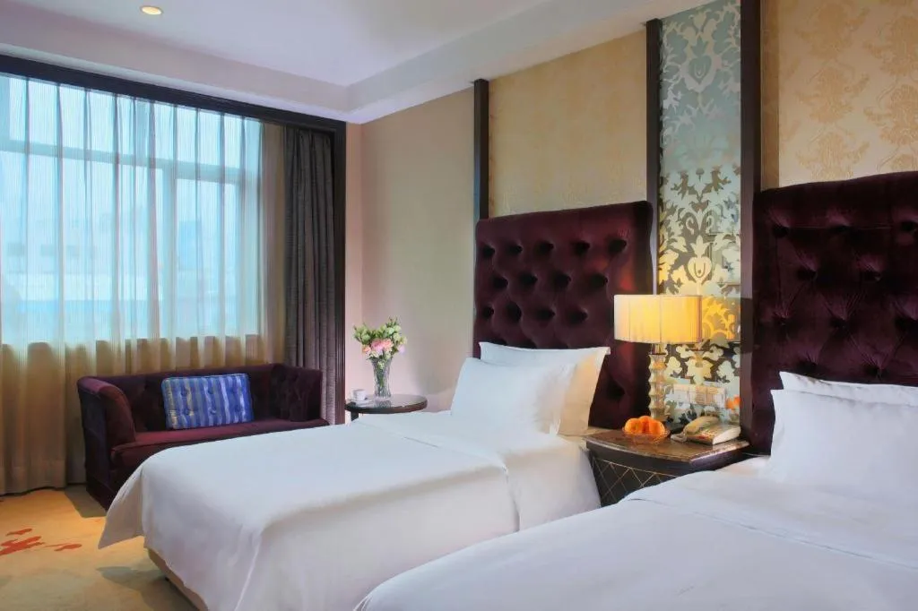 Bed in Dongguan Silver World Garden Hotel