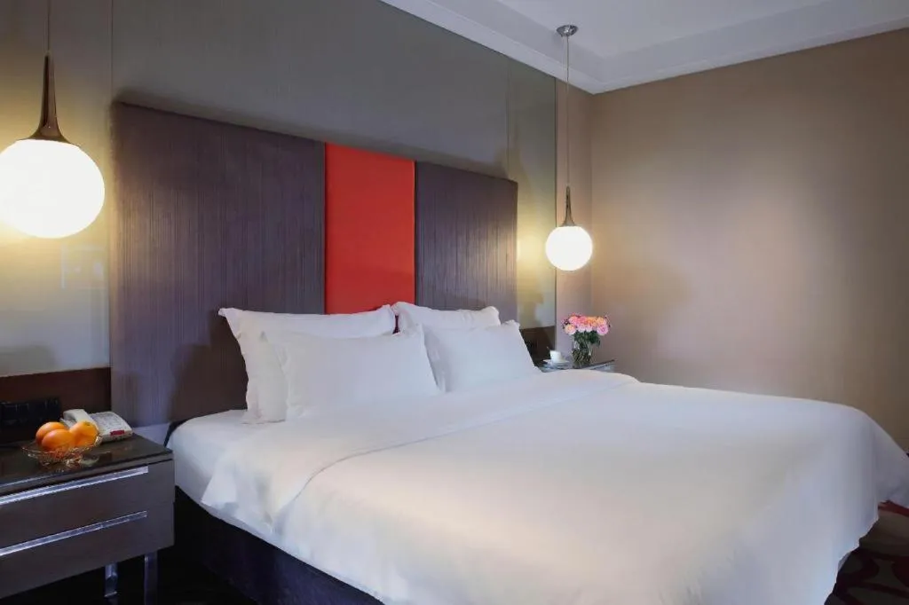 Bed in Dongguan Silver World Garden Hotel