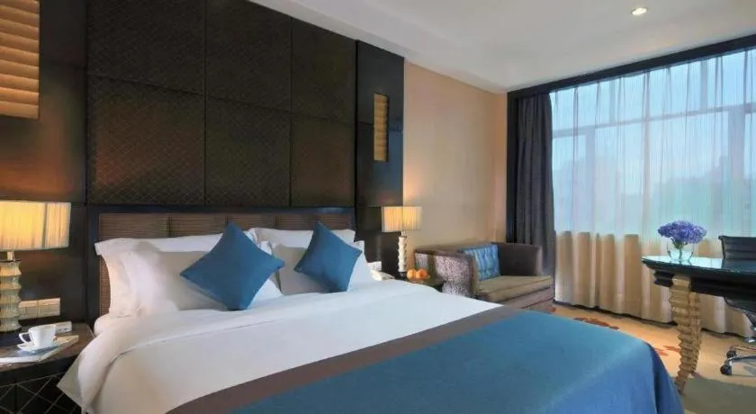 Bed in Dongguan Silver World Garden Hotel
