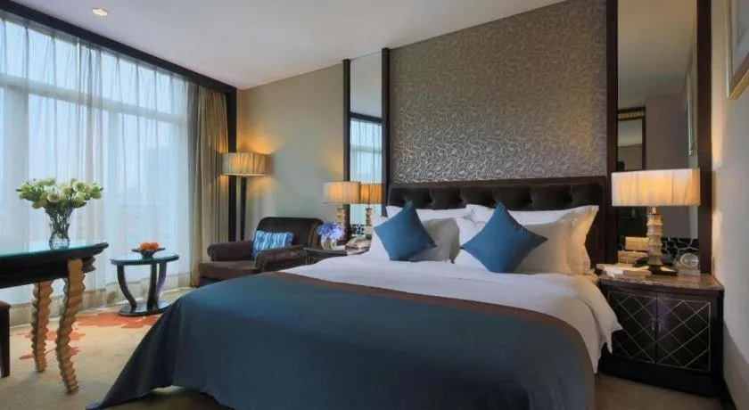 Bed in Dongguan Silver World Garden Hotel