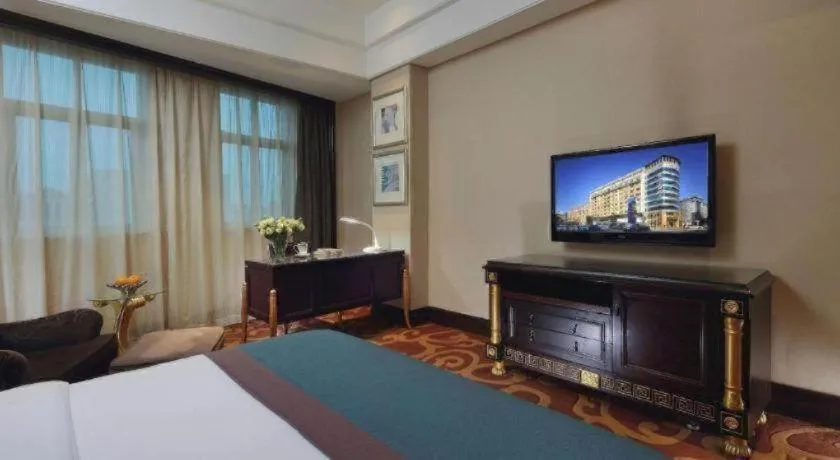 Bed in Dongguan Silver World Garden Hotel