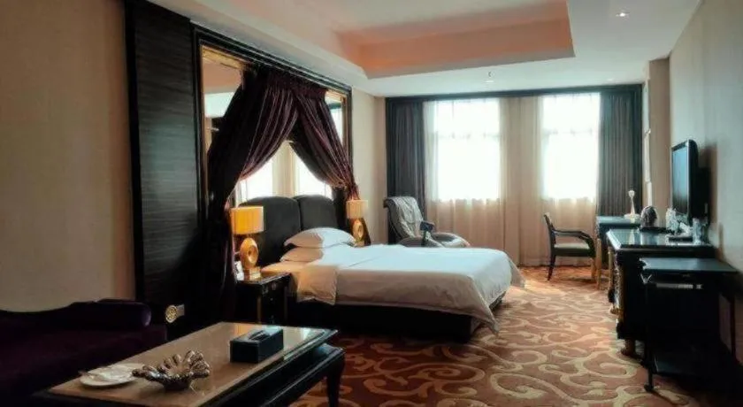 Bed in Dongguan Silver World Garden Hotel