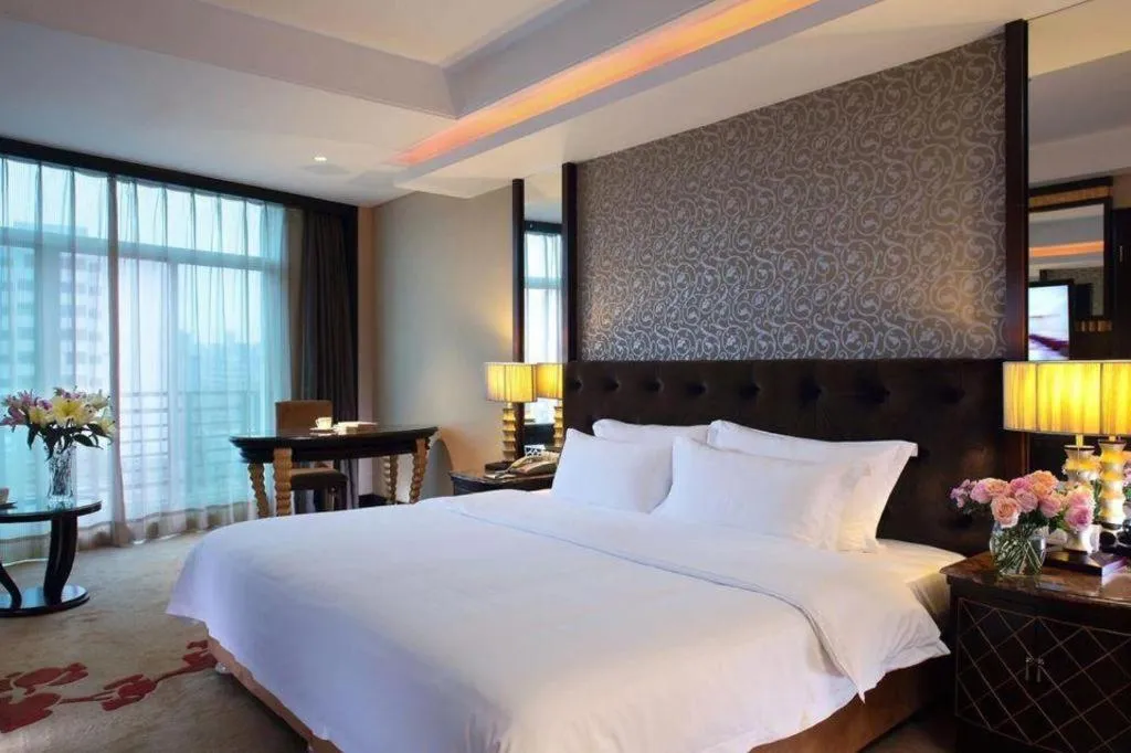 Bed in Dongguan Silver World Garden Hotel