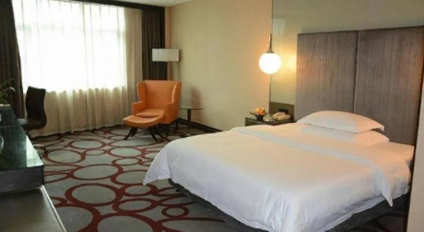 Bed in Dongguan Silver World Garden Hotel