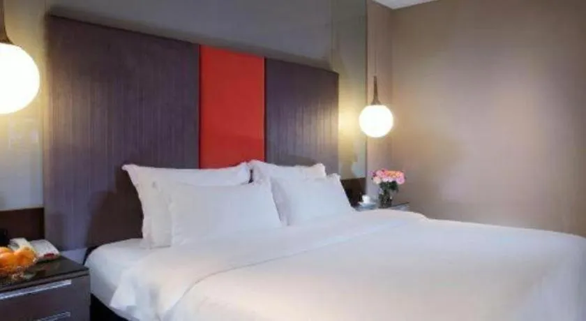 Bed in Dongguan Silver World Garden Hotel