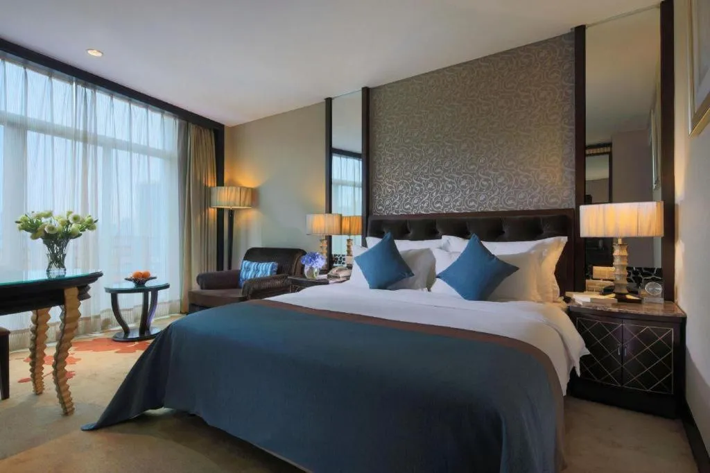 Bed in Dongguan Silver World Garden Hotel