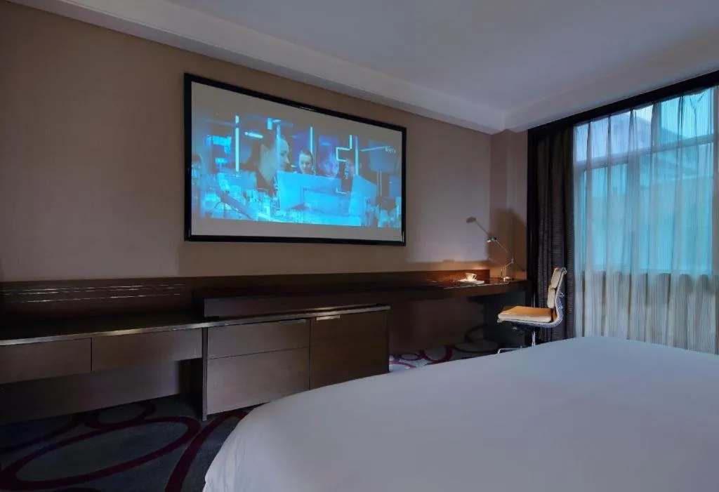 Bed in Dongguan Silver World Garden Hotel