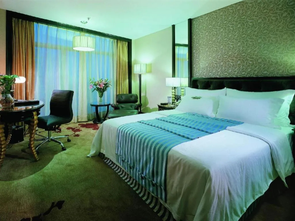 Bed in Dongguan Silver World Garden Hotel