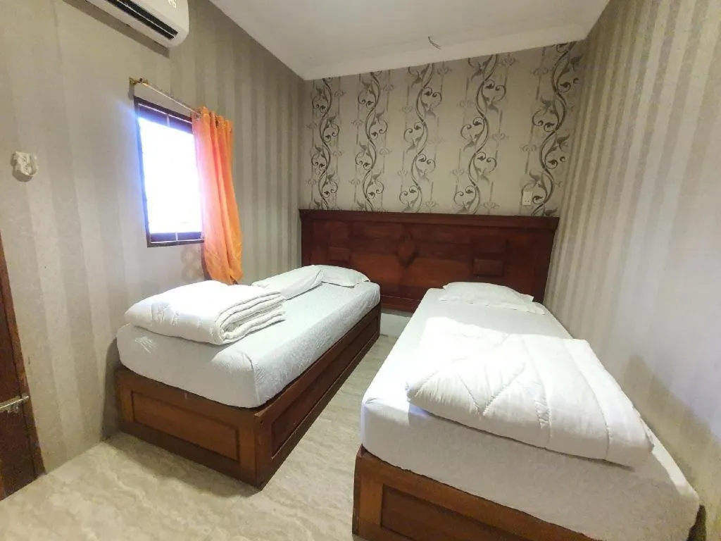 Bed in Hotel Bintang