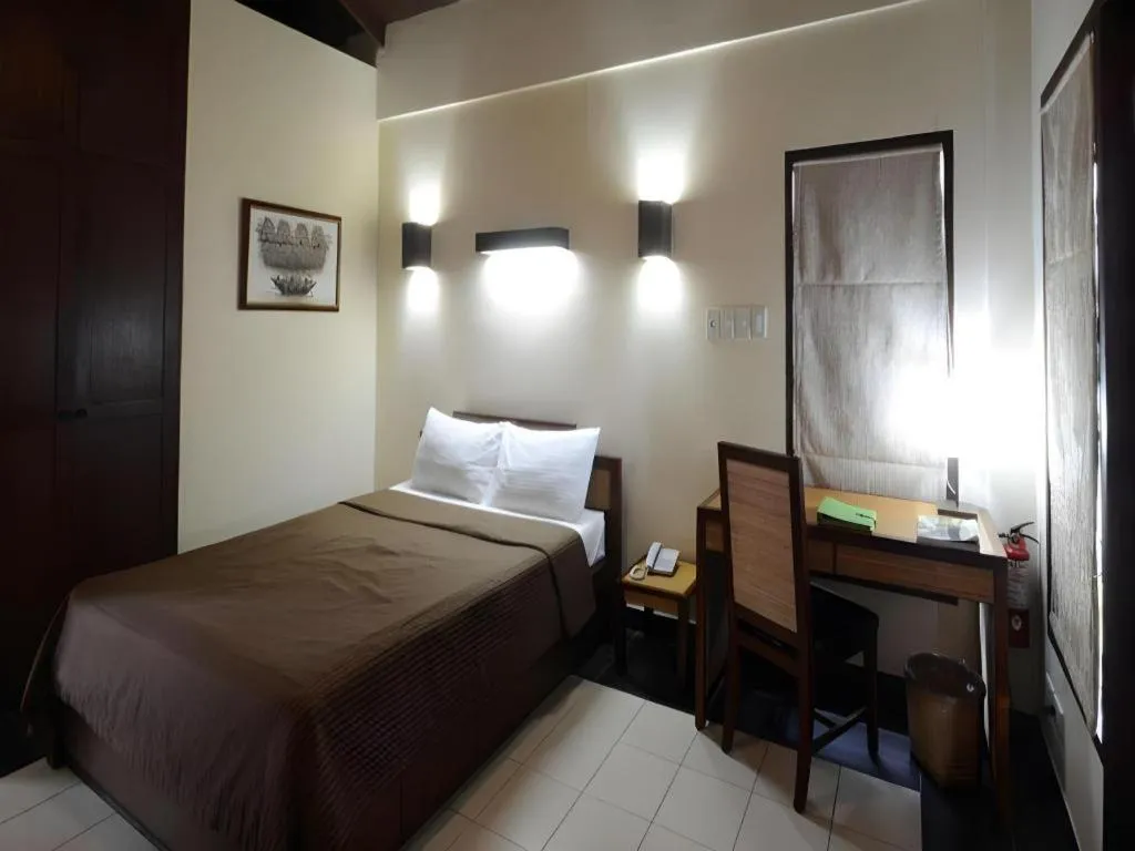 Bed in Kahuna Beach Resort and Spa