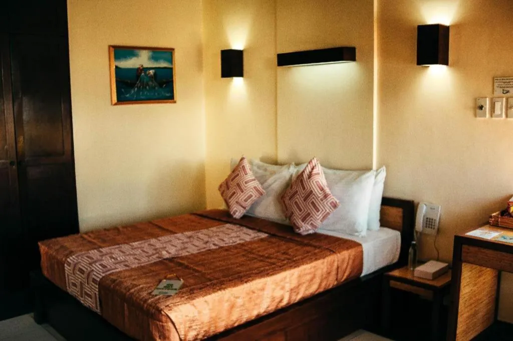 Bed in Kahuna Beach Resort and Spa