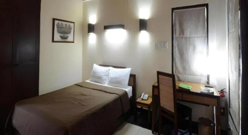 Bed in Kahuna Beach Resort and Spa